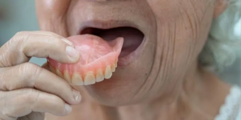 Mơ thấy rụng răng đánh con gì nếu là răng giả